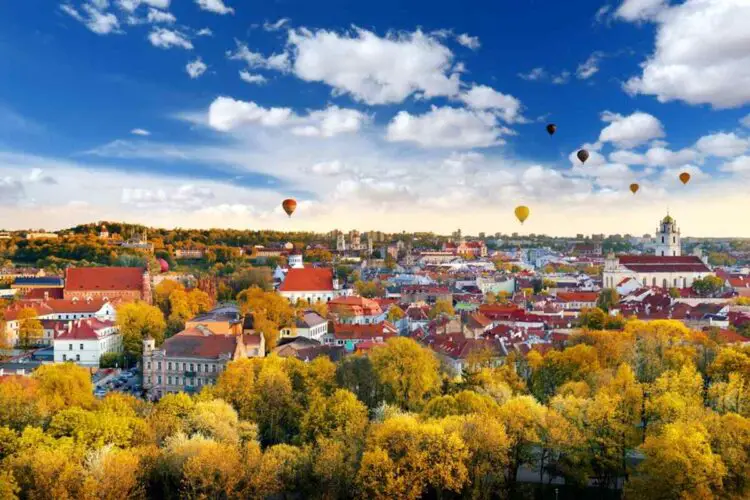 15 Awesome Facts About Lithuania That Will Blow Your Mind   Beautiful Autumn Panorama Of Vilnius Old Town With Colorful Hot Air Balloons In The Sky Taken From The Gediminas Hill  